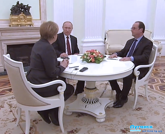 Фото с встречи между Олландом, Меркель и Путиным